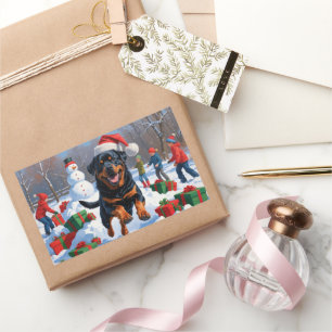 Rottweiler Running in Snow with Christmas Hat Rectangular Sticker