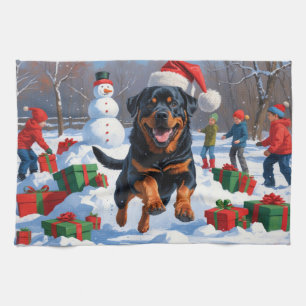 Rottweiler Running in Snow with Christmas Hat Tea Towel