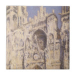 Rouen Cathedral, Harmony Blue Gold by Claude Monet Tile<br><div class="desc">Rouen Cathedral, Portal and Tour d'Albane, Full Sunlight, Harmony in Blue and Gold (1894) by Claude Monet is a vintage impressionism fine art architectural painting. A beautiful old church in Rouen, in northwestern France. The Rouen Cathedral series captures the façade of the cathedral at different times of the day and...</div>