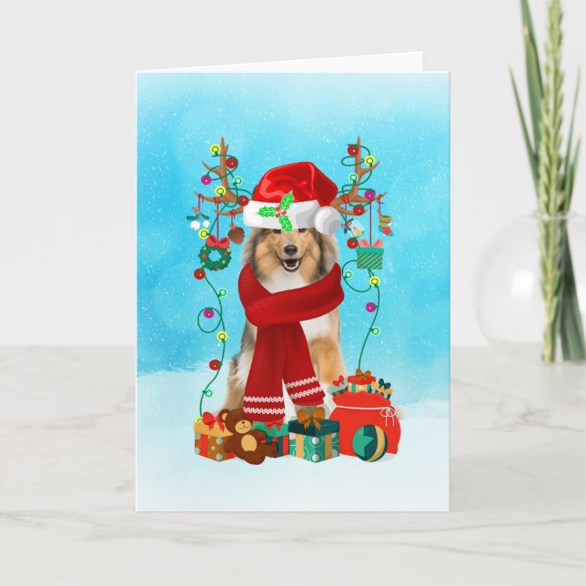 Rough Collie in snow with Christmas gifts Card (Front)