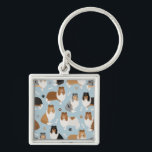 Rough Collie Paws and Bones Key Ring<br><div class="desc">Cute Rough Collie dogs sit and stand and rollover with sable,  tri-colour,  merle and white coats with scattered dog bones and pawprints pattern.</div>