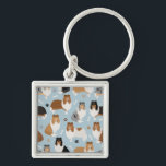 Rough Collie Paws and Bones Key Ring<br><div class="desc">Cute Rough Collie dogs sit and stand and rollover with sable,  tri-colour,  merle and white coats with scattered dog bones and pawprints pattern.</div>