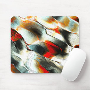 Rough silvery rock over burning ember, intensity mouse mat