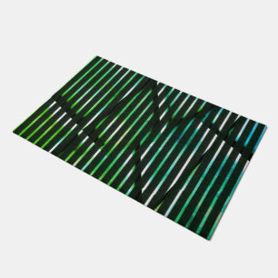 Rough stripes over green stained abstract design doormat