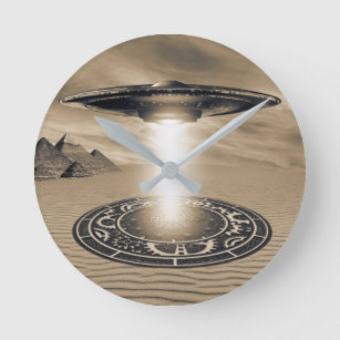Round faced wall clock with UFO and Alien artwork