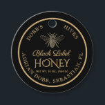 Round Honey Jar Necktag Black Gold Vintage Bee Favour Tags<br><div class="desc">Personalise this honey label with your apiary name, owner name, net weight and address. Elegant gold script font in the centre spells out "Black Label Honey." Vintage Bee illustration on a black background with a double gold border. The back of the label can be customised to explain why your honey...</div>