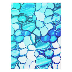 Round like stones in tones similar to aquamarine tablecloth