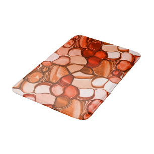 Round neven shapes like seeds, reddish coral tones bath mat