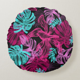 Round throw pillow in purple and blue.
