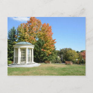 round white gazebo in autumn postcard