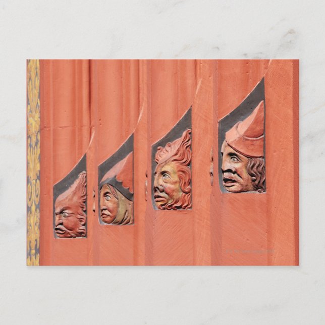 Row of ceramic heads along Basel's 16th Century Postcard (Front)