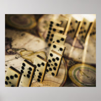 Row of dominoes on old world map 2