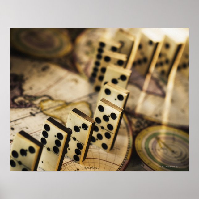 Row of dominoes on old world map 2 poster (Front)