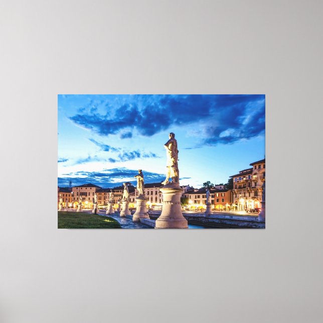 Row of illuminated statues in Padova Canvas Print (Front)