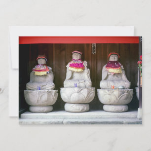 Row of Jizo monk statues with bib and hat - Japan Invitation