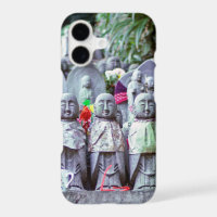 Rows of small Jizo monk statues with bibs - Japan