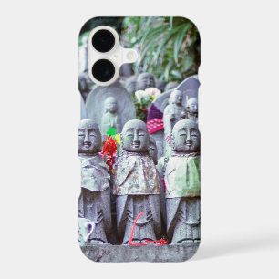 Rows of small Jizo monk statues with bibs - Japan