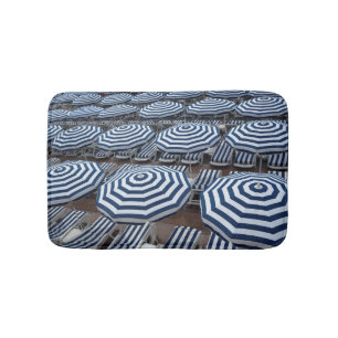 Rows Of Striped Beach Umbrellas With Sun Beds Bath Mat