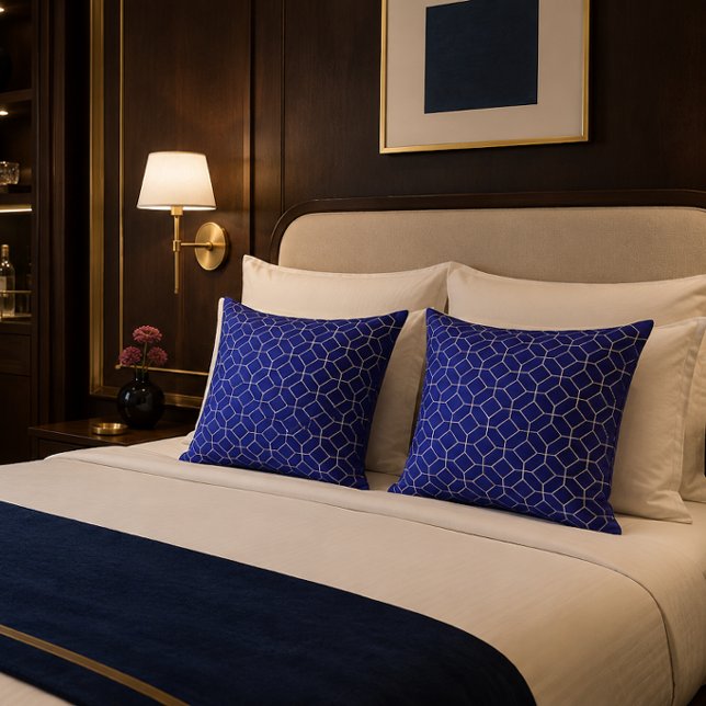 Royal Blue Geometric Throw Pillow Cushion (Royal blue geometric throw pillow adding elegant boutique hotel style to modern interiors.)