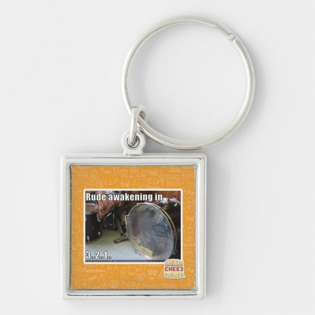 Rude awakening in key ring (Front)