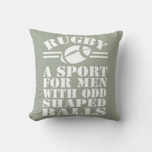Rugby a sport for men with odd shaped balls cushion
