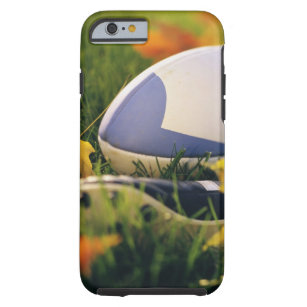 Rugby ball and shoe on lawn in autumn tough iPhone 6 case