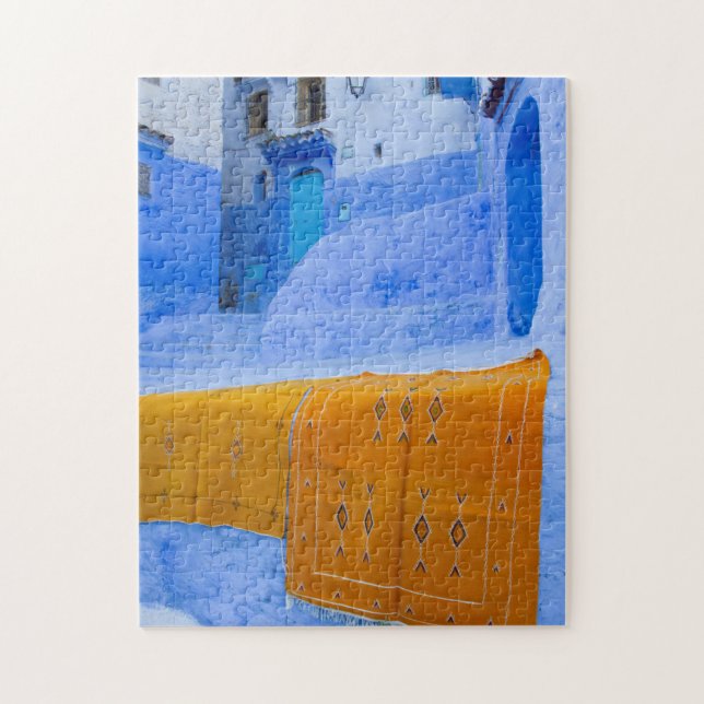 Rugs Draped On A Blue Wall Jigsaw Puzzle (Vertical)