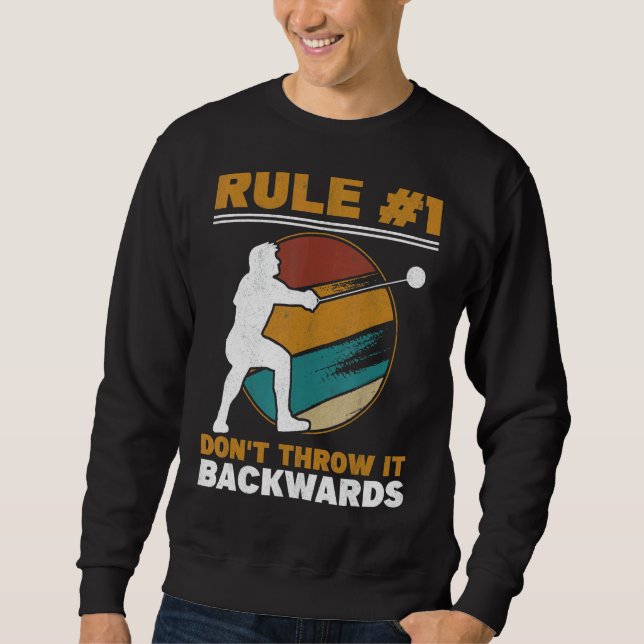 Rule 1 Don't Throw It Backwards Throwing Hammer Th Sweatshirt (Front)
