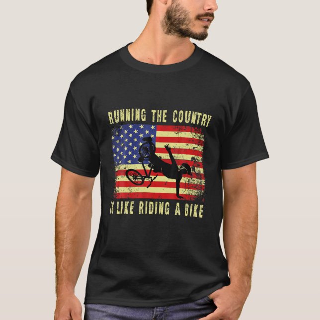 Running The Country Is Like Riding A Bike T-Shirt (Front)