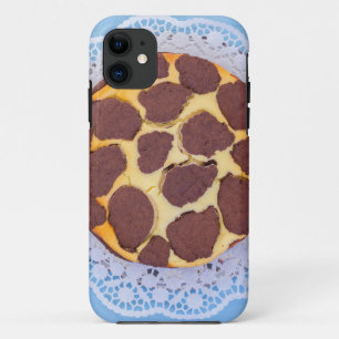 Russian chocolate cheesecake on a blue wooden back iPhone 11 case