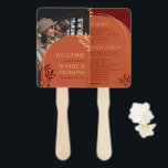 Rust Arch Greenery Photo Fall Wedding Program Hand Fan<br><div class="desc">Rust and burgundy wedding hand fan program personalised with a photo. Modern fall wedding program with peach-coloured greenery and a rust and burgundy colour palette with a photo of the couple. Autumn wedding hand fan program in orange and dark red.</div>