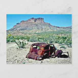 Rusted Antique Car In Front Of Butte Postcard