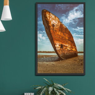 Rusted Shipwreck beached or stranded on a beach Poster