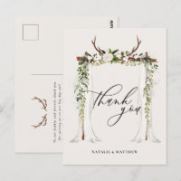 Rustic antler and watercolor floral canopy wedding