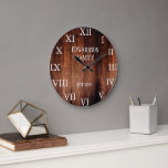 Rustic barn wood family name country large clock<br><div class="desc">Rustic,  dark barn wood wall clock with large Roman numbers.
You can personalise and add your own name and year established.</div>