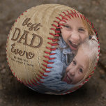 Rustic Best Dad Ever Photo Baseball<br><div class="desc">Celebrate fatherhood with a touch of warmth, nostalgia, and rustic charm with our 'Best Dad Ever' baseball gift. Fashioned over a wooden background for that vintage feel, this customisable item allows you to add the names of your children and two personal photos, making it not just a gift, but a...</div>