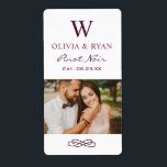 Rustic Burgundy Red Wedding Monogram Wine Photo<br><div class="desc">Rustic chic wedding wine bottle favour stickers feature a married monogram of the bride and groom names and last name initial,  wedding date,  and type of wine,  paired with a photo of the bride and groom. Ivory background with burgundy red / purple text.</div>
