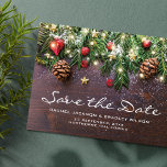 Rustic Christmas Wedding Save the Date Announcement Postcard<br><div class="desc">Rustic country save the date wedding postcards featuring a dark wooden background,  festive christmas tree branches,  red & gold tree decorations,  string twinkle lights,  and a text template that is easy to personalise.</div>