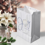 Rustic Coastal Christmas Seashell Joy Medium Gift Bag<br><div class="desc">Rustic Coastal Christmas Seashell Joy Gift Bag featuring festive,  elegant typography of Joy to the World using a nautical watercolor seashell as the "o" in Joy.</div>