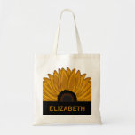 .Rustic Country Burlap Sunflower Wedding Favours Tote Bag<br><div class="desc">Wedding favours design featuring a graphically created sunflower on a burlap background utilising the colours of multi-tonal golden yellow,  rust and black with the burlap background being a khaki tone.</div>