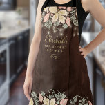 Rustic country elegant floral kitchen chef apron<br><div class="desc">Chef personalized vintage rustic chic kitchen apron featuring delicate blush pink, peachy cream, and sage green floral botanical wildflowers borders on a dark brown barn wood background with string lights. It can be a beautiful gift for your own kitchen or a keepsake personalized gift for someone special, anniversary, birthday, Christmas,...</div>