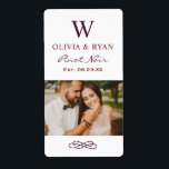 Rustic Dark Red Wedding Monogram Wine Photo<br><div class="desc">Rustic chic wedding wine bottle favour stickers feature a married monogram of the bride and groom names and last name initial,  wedding date,  and type of wine,  paired with a photo of the bride and groom. Ivory background with dark red / purple text.</div>