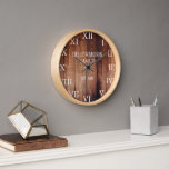 Rustic dark wood family name farmhouse clock<br><div class="desc">Rustic,  dark barn wood wall clock with large Roman numbers.
You can personalise and add your own name and year established.</div>