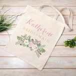 Rustic Dusty Pink Floral Bouquet Bridesmaid Tote Bag<br><div class="desc">A beautiful watercolor bouquet of dusty pink roses, ivory blooms, purple berries, and rich sage greenery sits beneath a personalized name in soft pink calligraphy script with the bridal party role in warm gold lettering. This moody, romantic design suits fall and winter wedding celebrations beautifully. A lovely keepsake your wedding...</div>