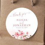Rustic elegant watercolor floral thank you wedding classic round sticker<br><div class="desc">Elegant simple spring summer rustic floral botanical pink blush watercolor flowers thank you wedding sticker template featuring a chic calligraphy script.                Easy to personalise with your text,  names,  and date!             Suitable for outdoor rustic country boho love in bloom bohemian weddings.</div>