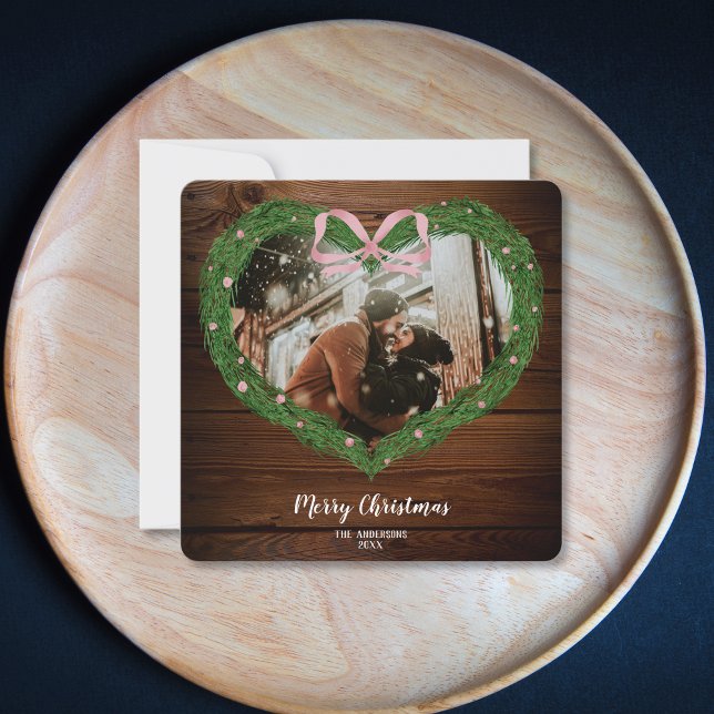 Rustic Farm Merry Christmas Heart Wreath Photo  Invitation (heart shaped christmas wreath with a pink bow on the wood background)