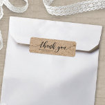Rustic Faux Kraft Script Thank You Wedding Favour<br><div class="desc">This rustic wedding favour label features the words "thank you" in dark grey script against a kraft like pattern background. It's great for labelling your wedding favour gifts. It is easy to personalise; just replace the placeholder text to add your own information. For more options such as to change the...</div>
