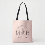 Rustic Floral Stem Wedding Monogram | Blush Tote Bag<br><div class="desc">Custom printed tote bags make a fun and functional wedding favour your guests will love! Personalise the template with the bride and groom's names or monogram initials. Add your wedding date, the city, state or venue name or any other custom text. This modern rustic logo-style design has a simple floral...</div>