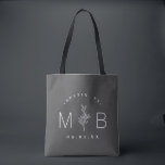 Rustic Floral Stem Wedding Monogram | Charcoal Tote Bag<br><div class="desc">Custom printed tote bags make a fun and functional wedding favour your guests will love! Personalise the template with the bride and groom's names or monogram initials. Add your wedding date, the city, state or venue name or any other custom text. This modern rustic logo-style design has a simple floral...</div>