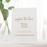 Rustic Gold Capture The Love Wedding Hashtag Sign<br><div class="desc">This rustic gold Capture the Love wedding hashtag sign is perfect for a country wedding. The simple and modern gold and white design features unique whimsical handwritten calligraphy lettering with a contemporary minimalist boho style. Customisable in any colour. Keep the design minimal and simplistic, as is, or personalise it by...</div>